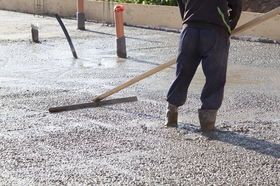 man using the concrete trowel