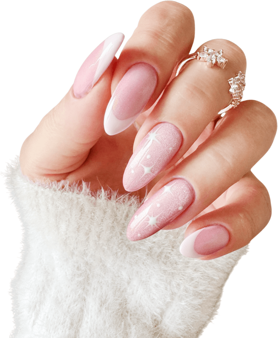 Close-up of a hand with almond-shaped nails featuring pink glitter, star decals, and white French tips, wearing a ring.