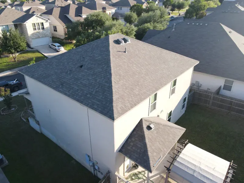An aerial view of a house with a new roof