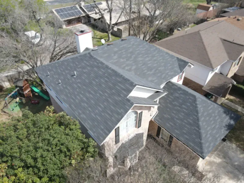 An aerial view of a house with a new roof