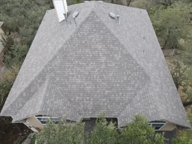 An aerial view of a roof with satellite dishes on it