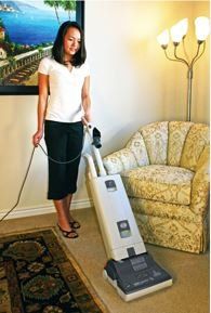 Beam — Woman Holding White Vacuum in Meridian, ID