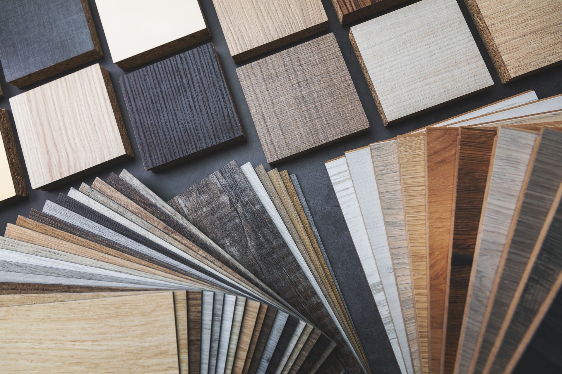 Various wood flooring samples in different colors and textures.
