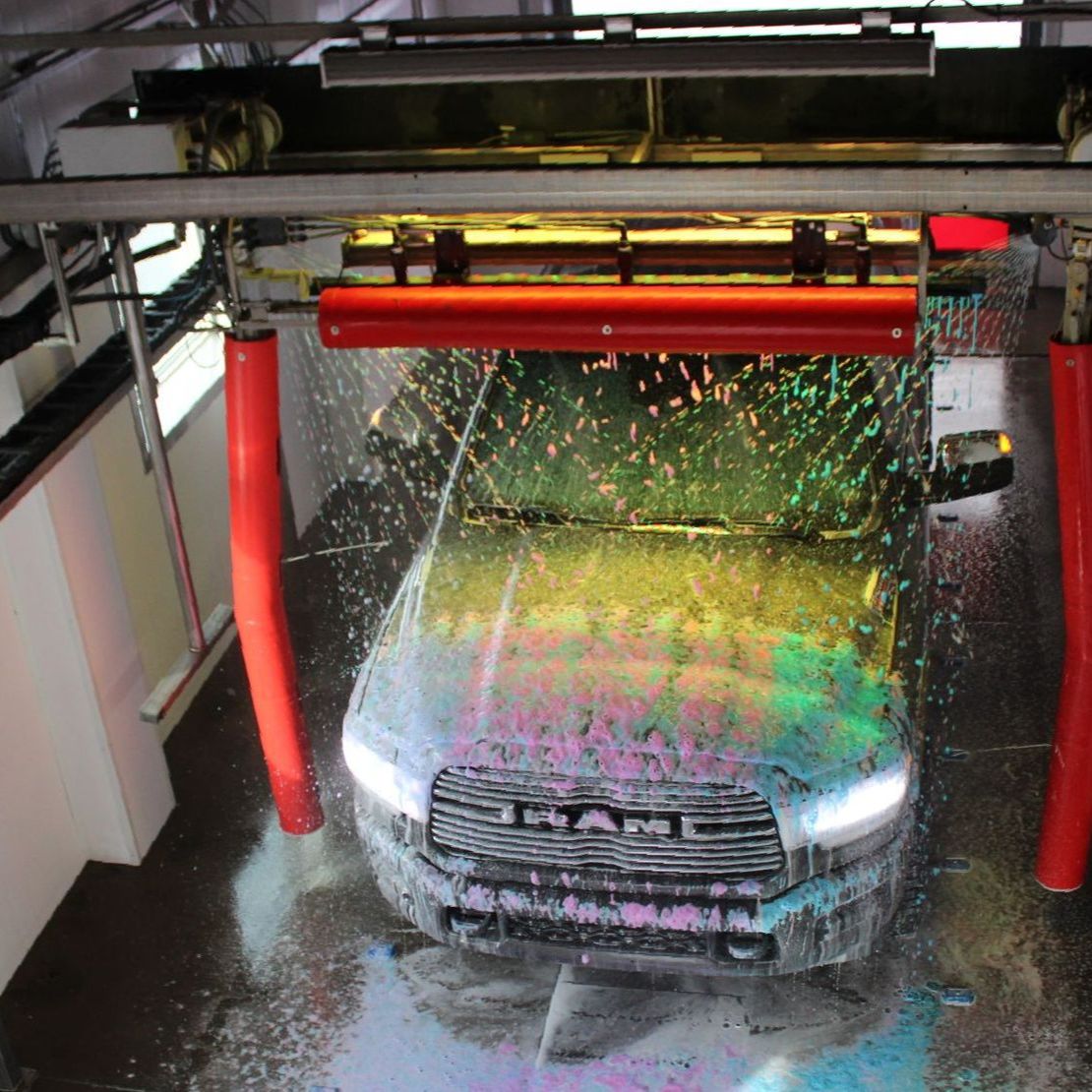 Yellow sudsy car, carwash consulting, design and installations