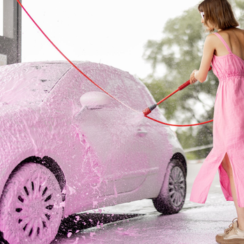Gun sprinkles pink foam on car at self-service car wash Stock Photo - Alamy