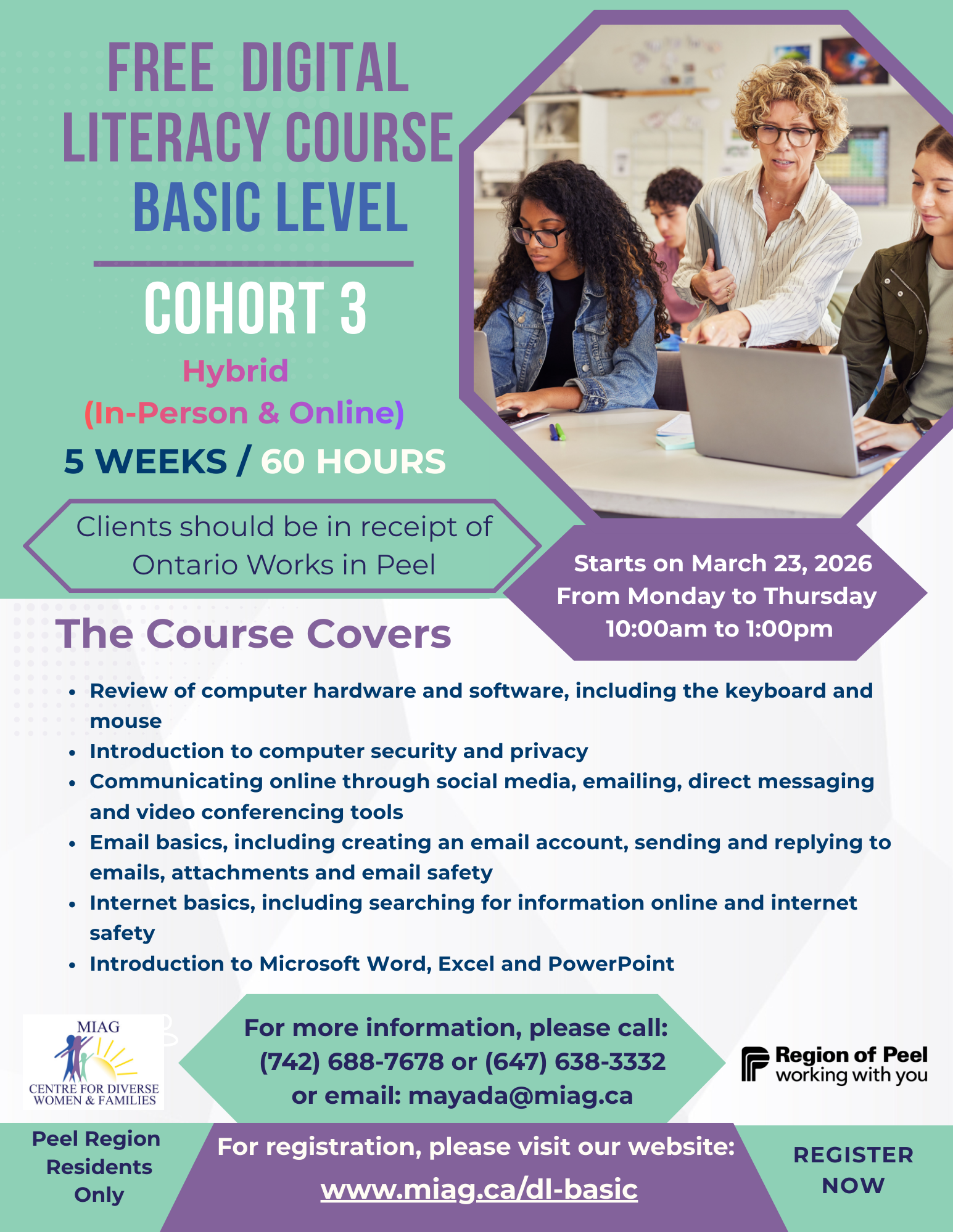 A group of women are standing around a table in an office.