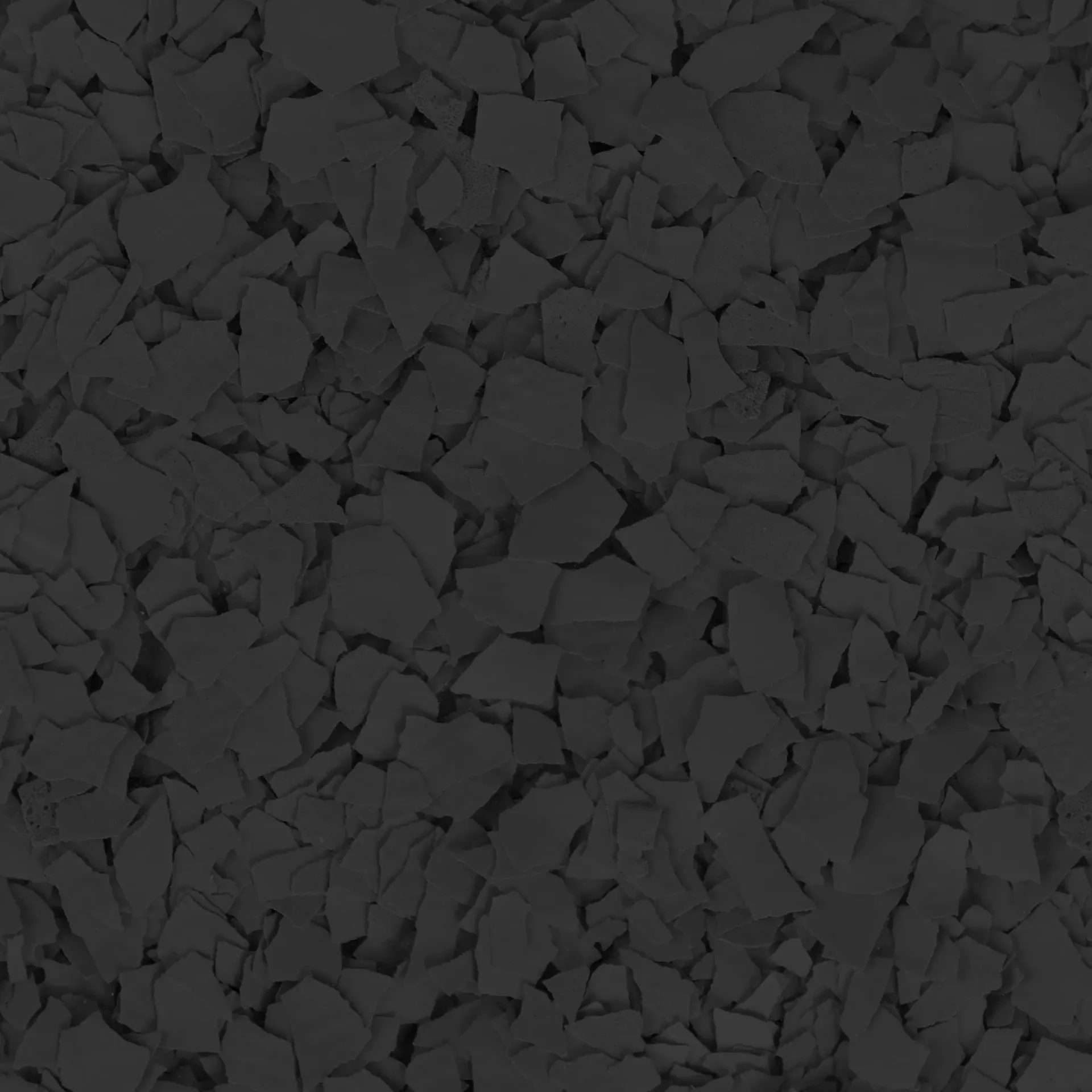 Dark gray crushed stone or gravel filling the frame.