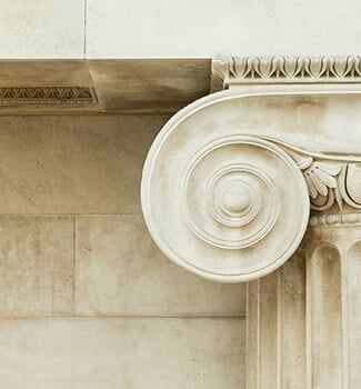 Decorative detail of an ancient Ionic column - Law Group in St Anacortes, WA