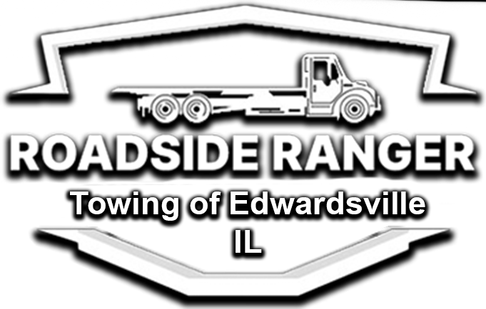 The logo for edwardsville towing service shows a tow truck with a flat bed.