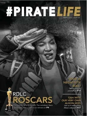A black and white photo of a woman on the cover of a magazine