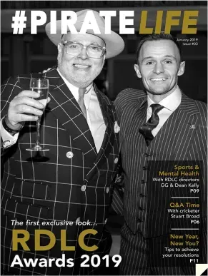 Two men are standing next to each other on the cover of a magazine.