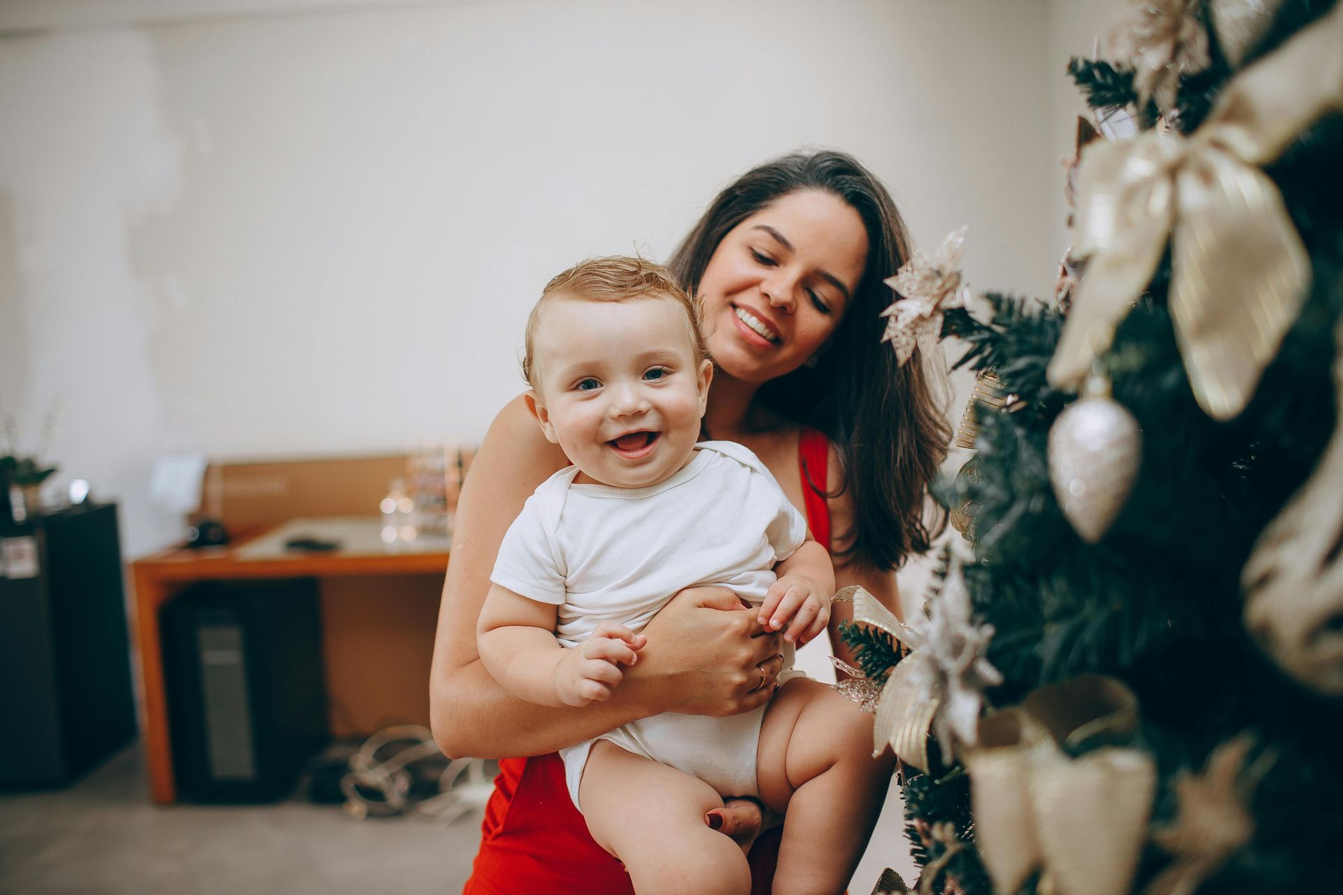 A person receiving a facial treatment. A esthetician applies a mask to the client's face.