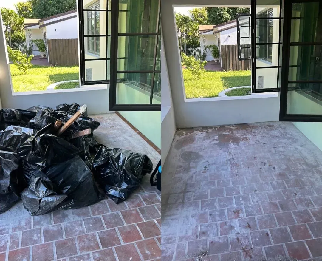 Before and after images of a room with brick flooring, windows, and a backyard view. The 