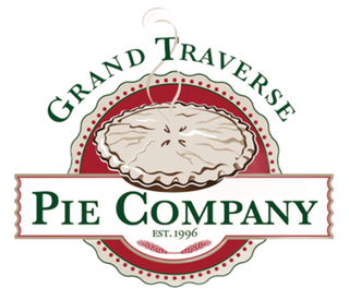 A logo for mercantile bank with a gold triangle on a white background