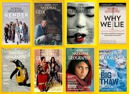 A collection of national geographic magazines on a yellow background.