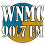 A logo for wnmc 90.7 fm with a globe in the background