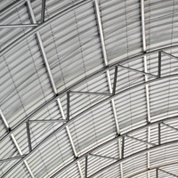 A close up of a metal roof of a building.