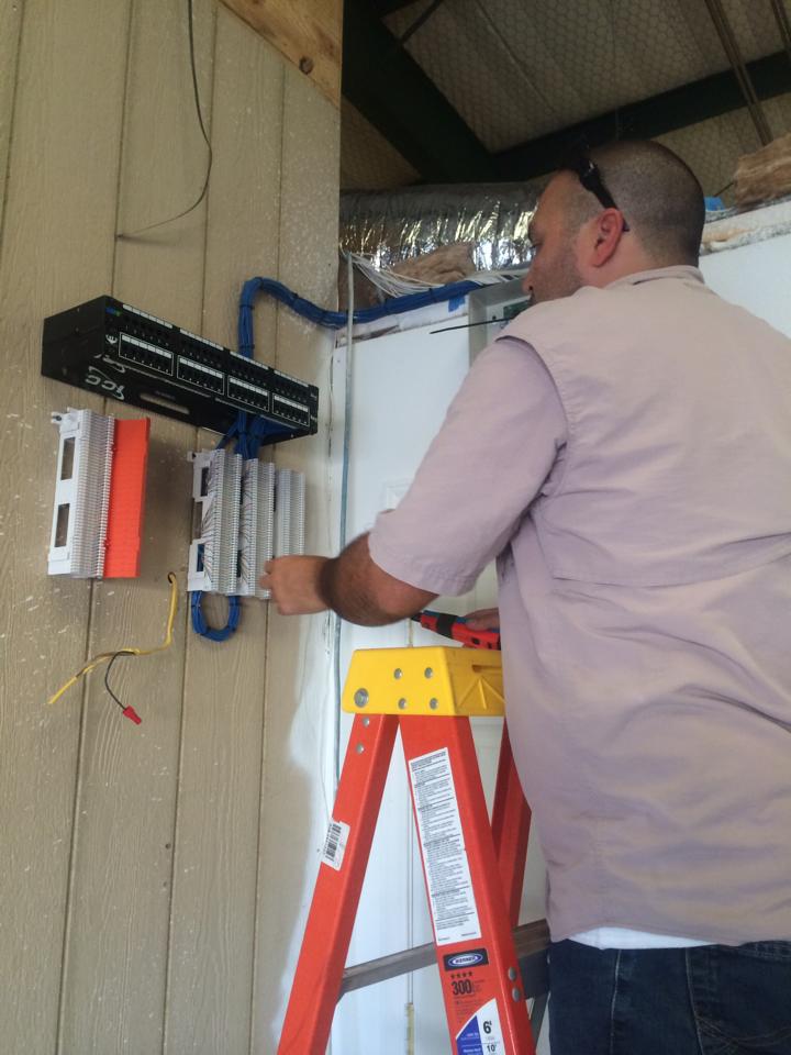 Man Installing the Connection — West Monroe, LA — DSC Security & Communications LLC