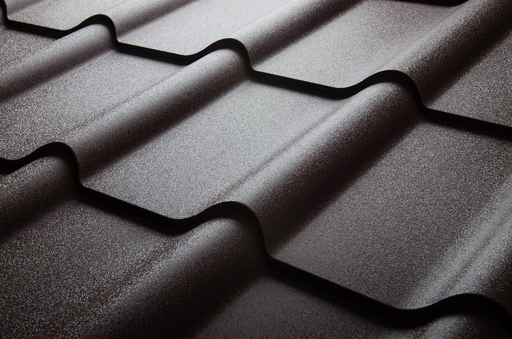 A Close Up of a Black Tile Roof — SRV Roofing in Gympie, QLD
