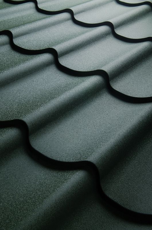 A Close Up of a Black Roof With a Swirl Pattern — SRV Roofing in Caloundra, QLD