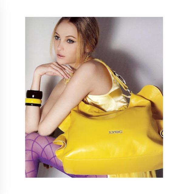 girl with yellow handbag