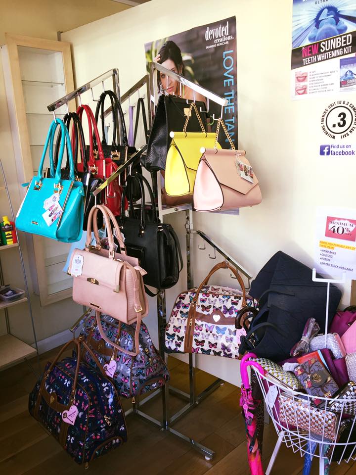 handbags on display in shop