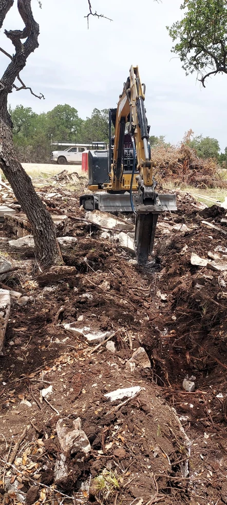 Yellow Excavator Digging the Land