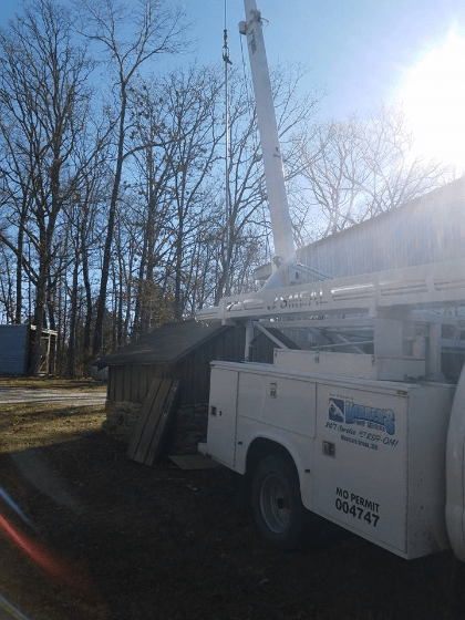 Truck Beside The House — Mountain Grove, MO — Harker Pump & Plumbing