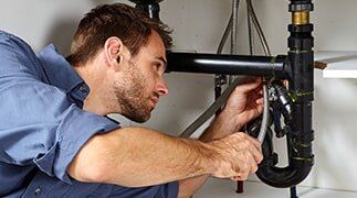 Plumbing Repairs — Plumber Fixing Pipe in Syracuse, NY Plumbing Repairs — Plumber Fixing Pipe in Syracuse, NY