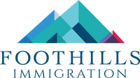 Logo for Foothills Immigration: geometric mountain in shades of teal, blue, and a touch of red. Text below.