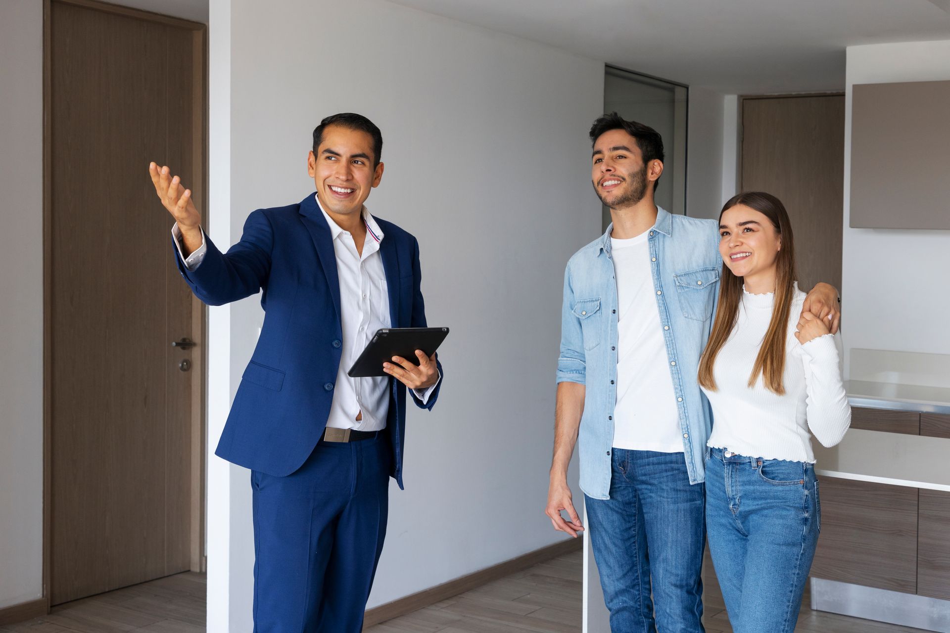 Property broker talking with couple