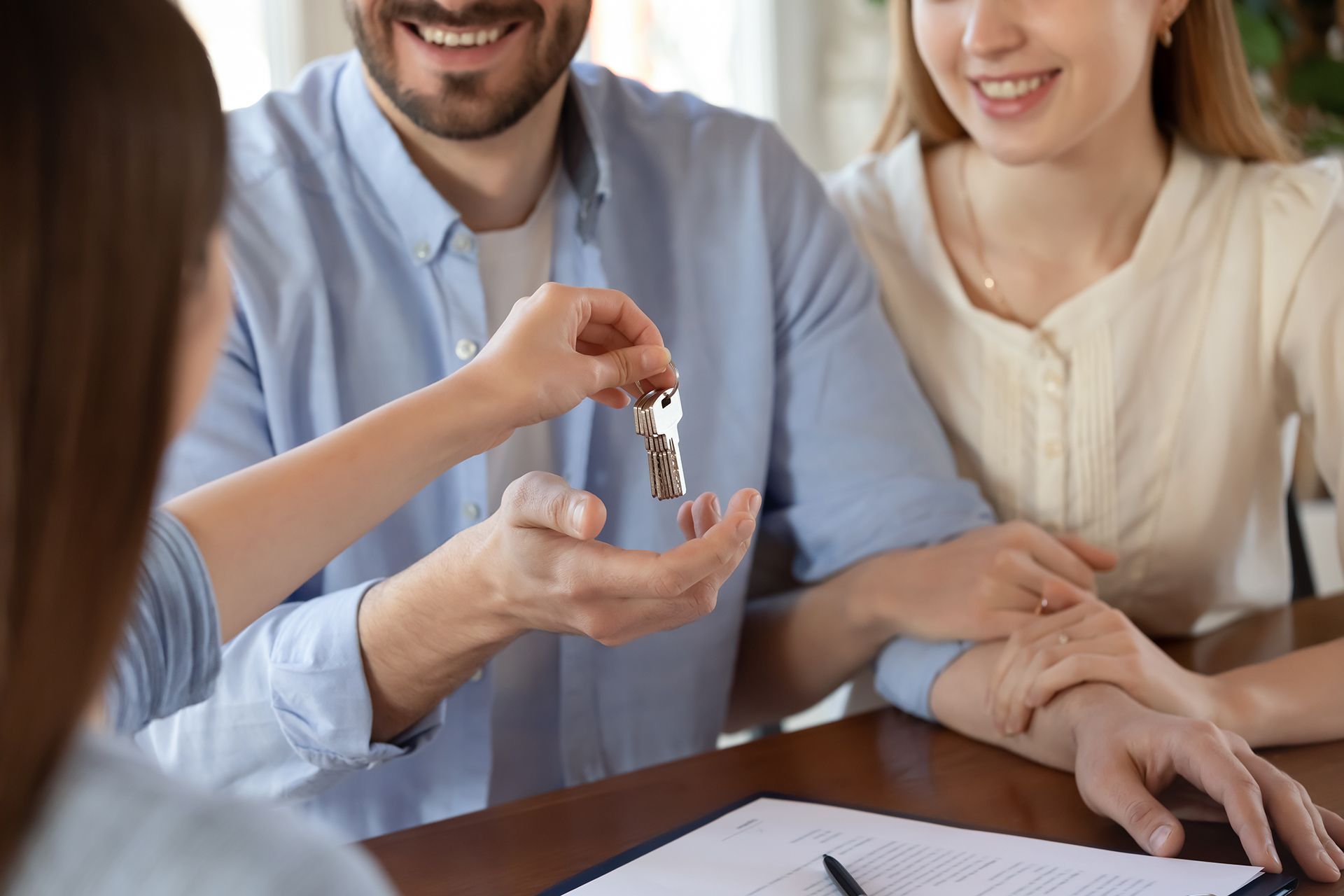 Giving House Key to Couple