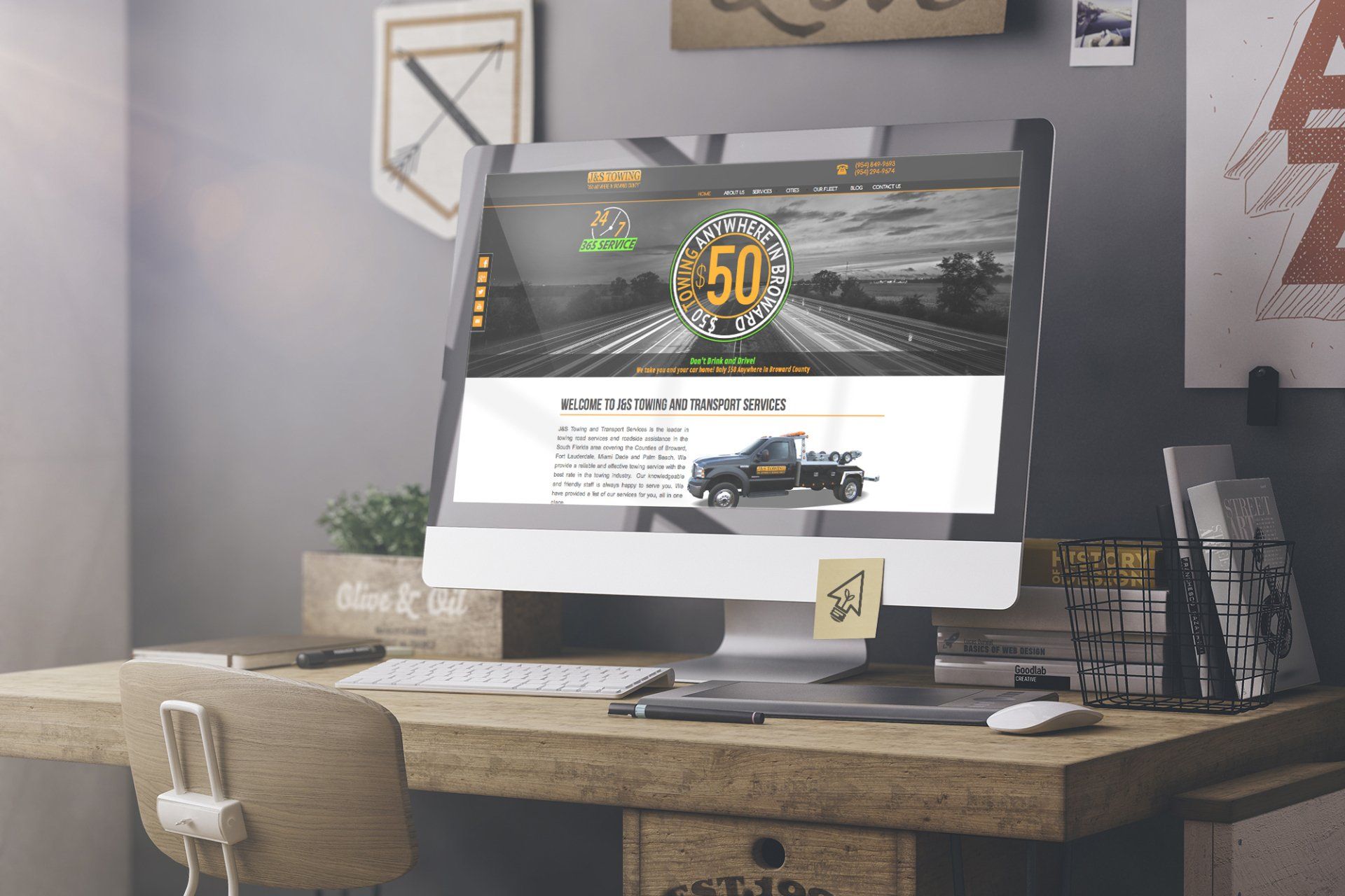 a computer monitor is sitting on top of a wooden desk .