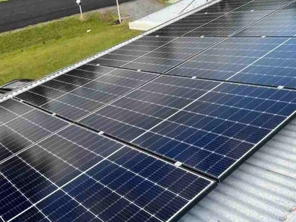 Solar Panels Arranged on A Rooftop — JW Electrical, Air & Solar Pty Ltd in Kew, NSW