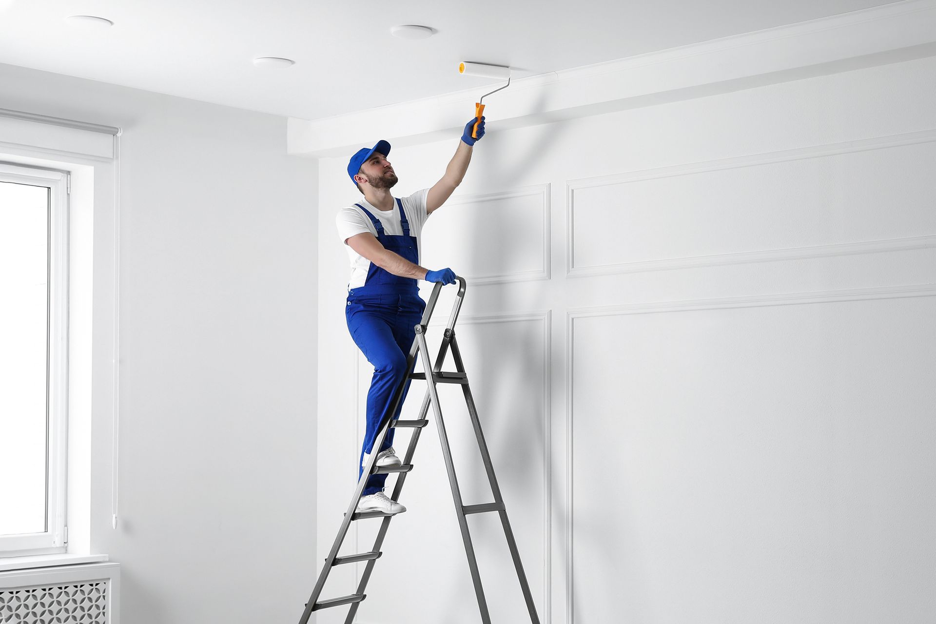 Man Painting the Ceiling