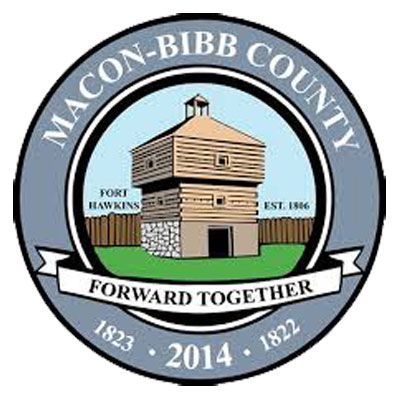Macon-Bibb County seal with Fort Hawkins illustration and “Forward Together” banner, blue-gray circular emblem