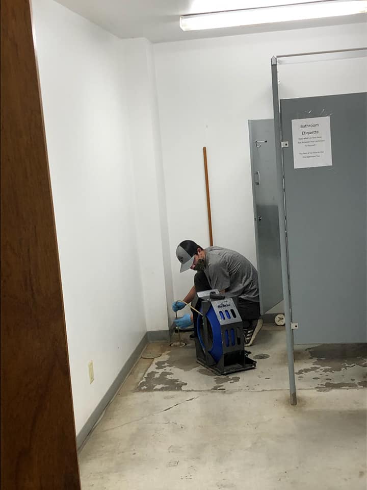 clean drain employee doing a video camera inspection