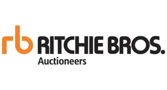 Logo of Ritchie Bros. Auctioneers, black text with orange "rb" letters.