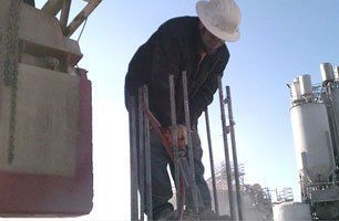 Cutting the Excess Metal — Desert Hot Springs, CA — Spartan Concrete