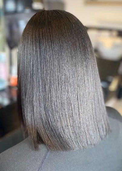 Black silk pressed hair