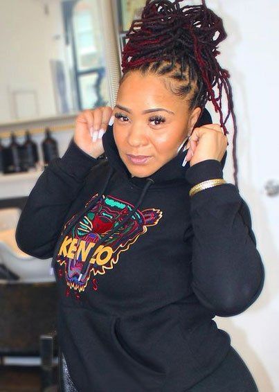 Woman with Afro hair wearing hoodie