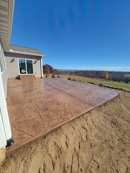 rounded stamped concrete patio in St. Charles MO by L & S Concrete STL