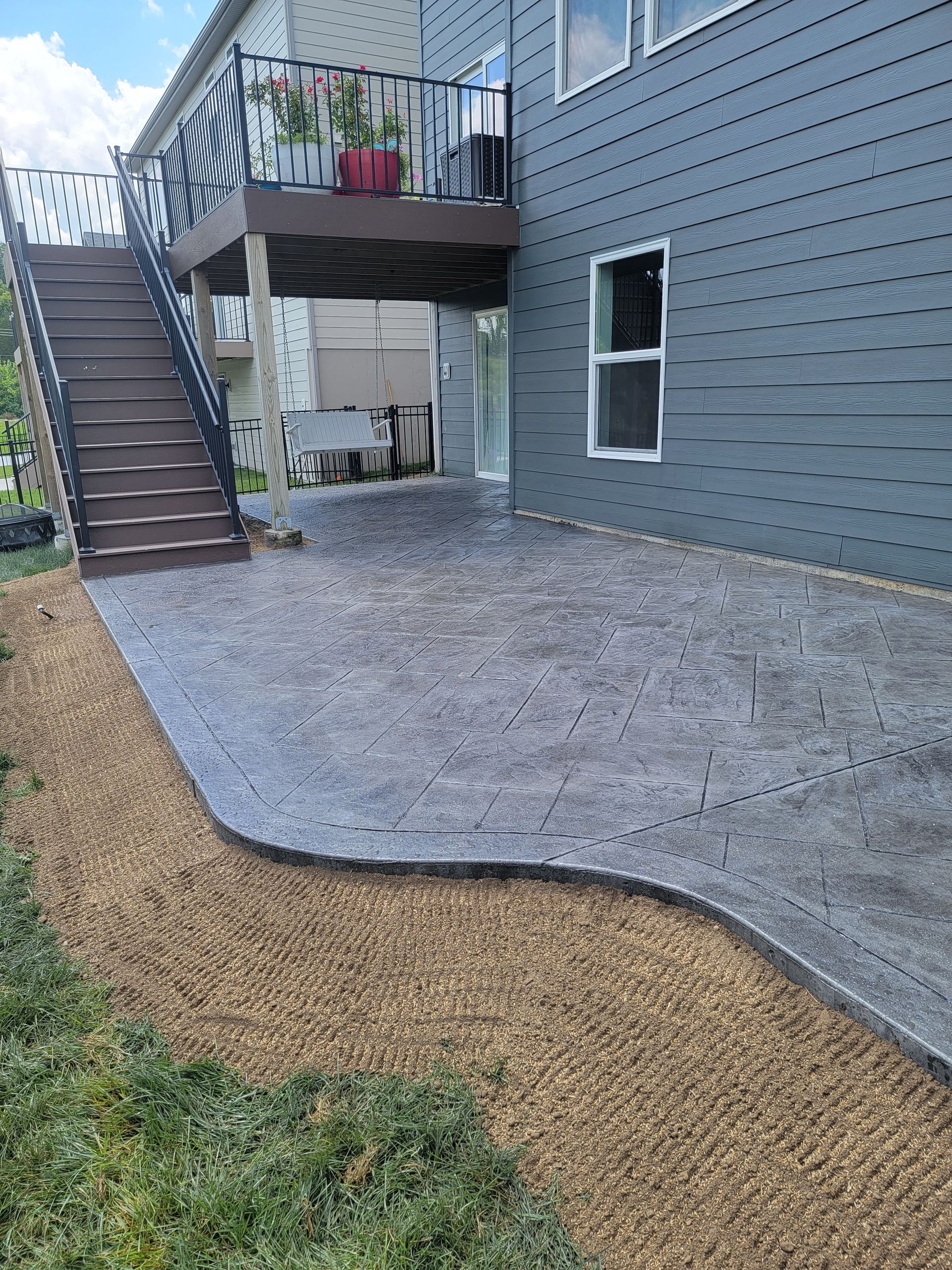 rounded concrete patio in Wentzville MO by L & S in STL