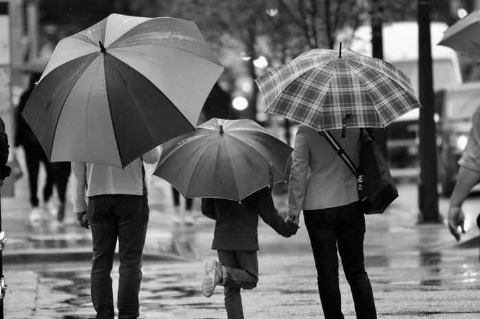 family with umbrella