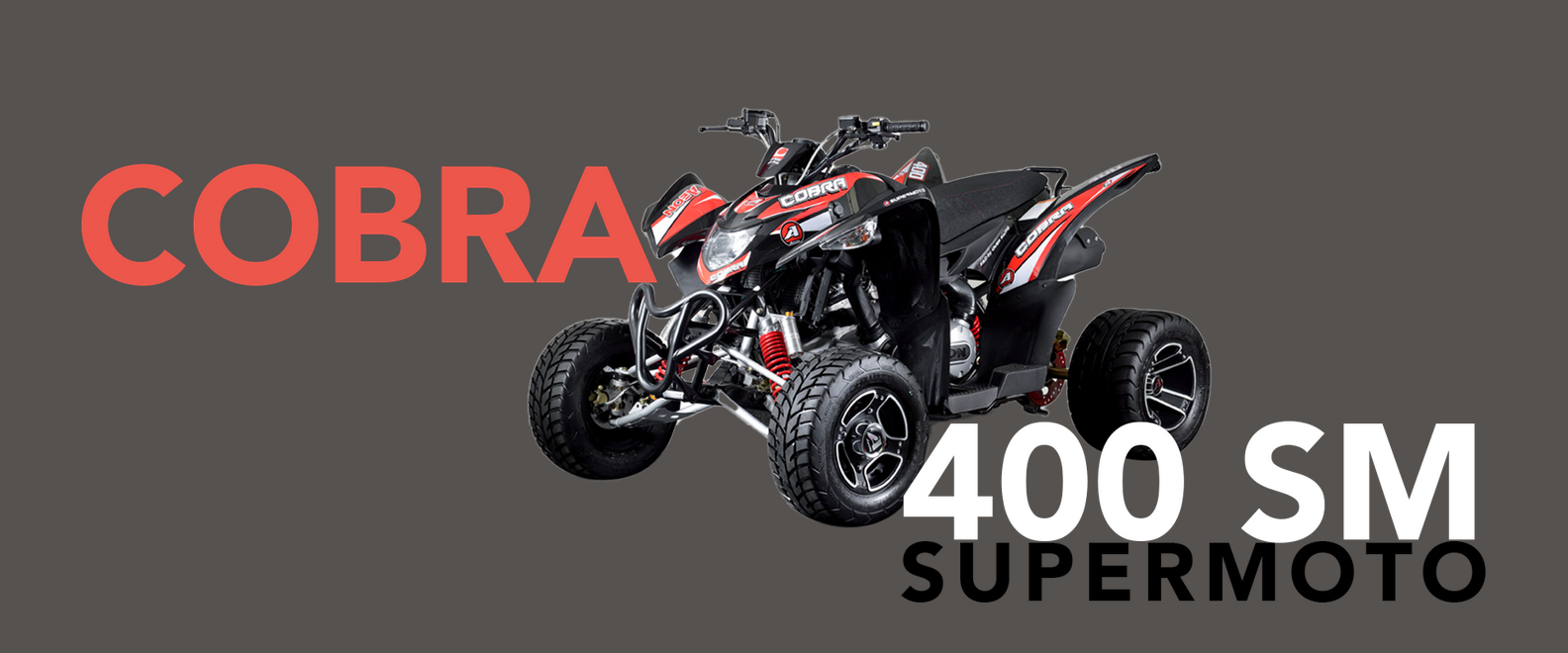ATV Cobra 400 SM Supermoto rosso e nero su sfondo grigio.