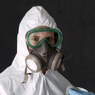 Asbestos Removal Technician in Safety Mask