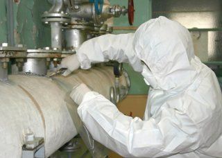 Hazardous Waste Removal Technician in Hazmat Suit