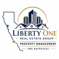 Liberty One Real Estate Group Logo - Click to go to Home Page