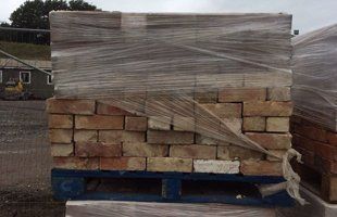 bricks stacked and wrapped