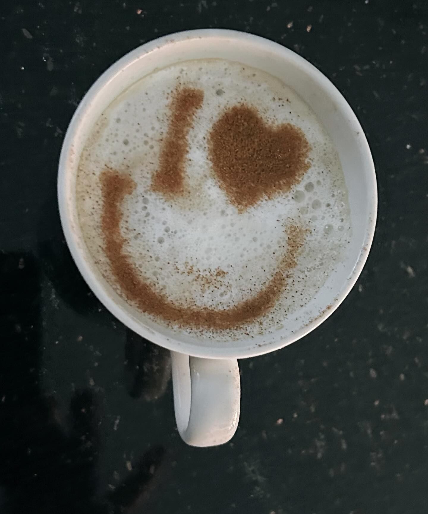 Cup of coffee with a cinnamon 